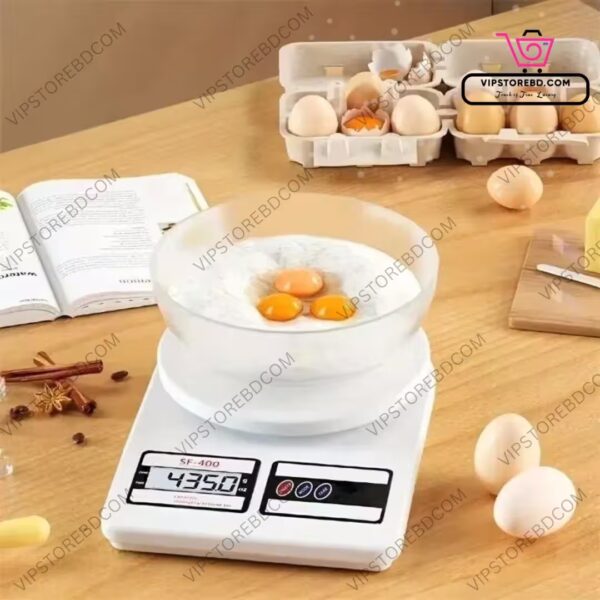 Kitchen scale measuring flour and eggs for baking accuracy.